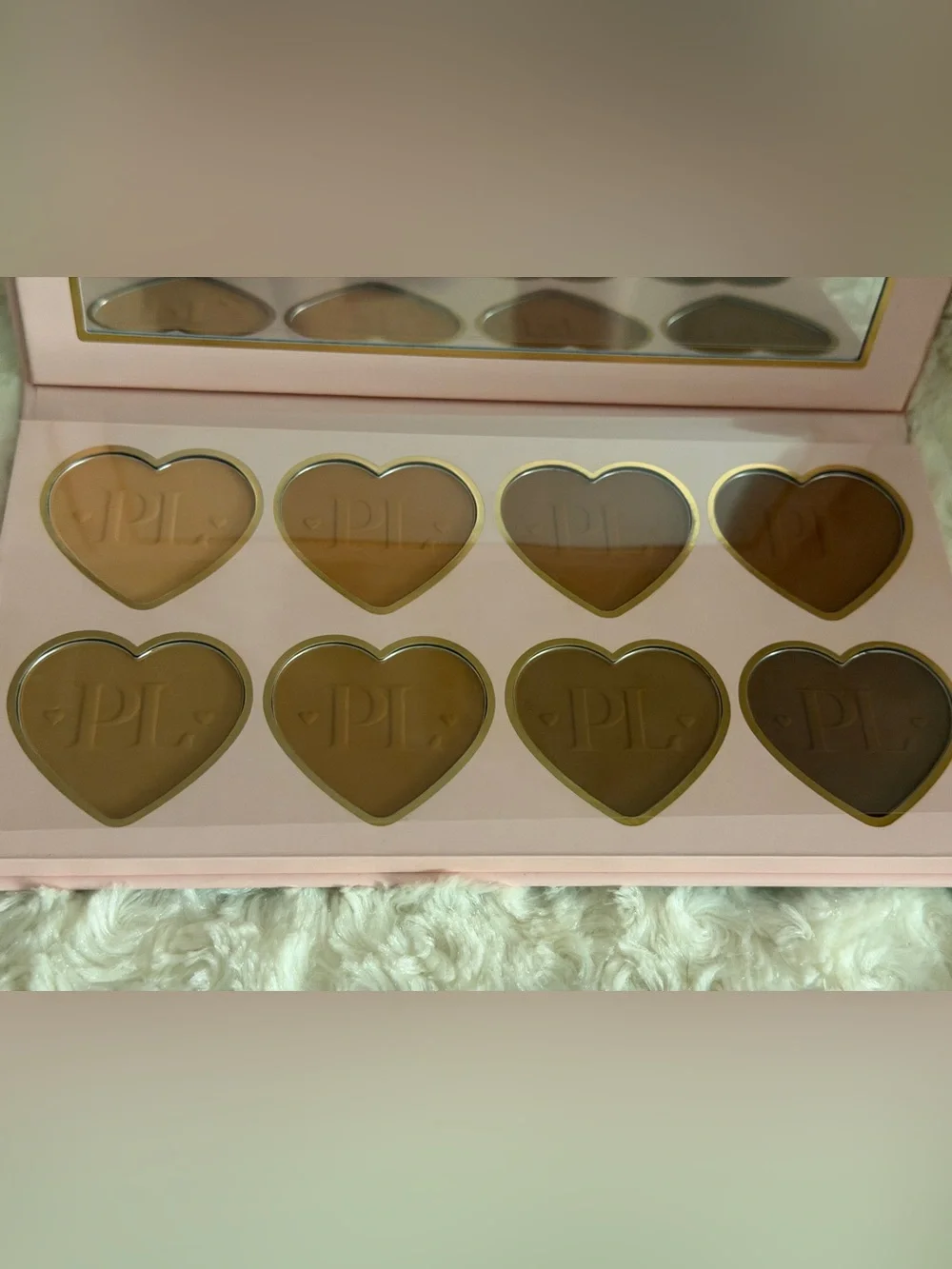 PLouise Bronzer, highlight, and contour Palettes